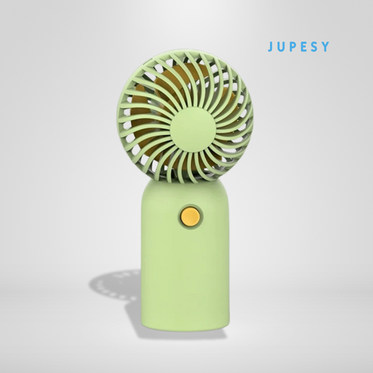 Green handheld fan with visible brand 'JUPESY' on a light gray background