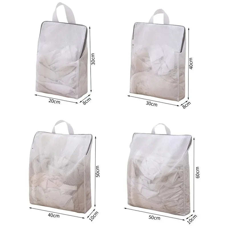 Set of four white bags with dimensions indicated on a white background