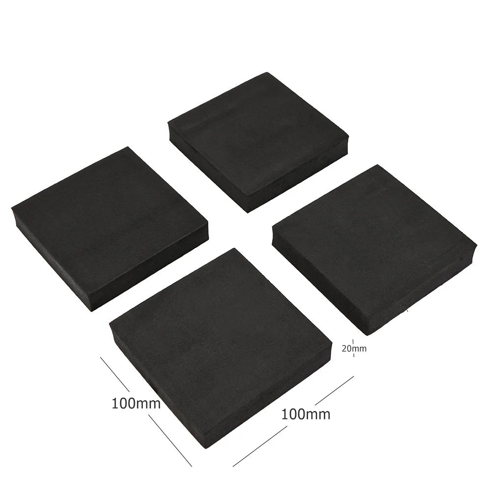 Four black square pads with dimensions on a white background