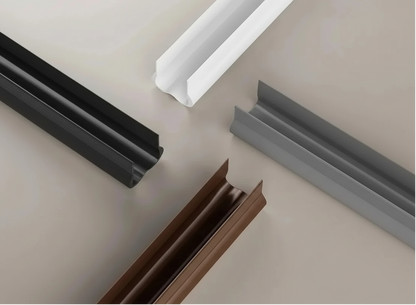 Four profiles in white, gray, black, and brown on a neutral background